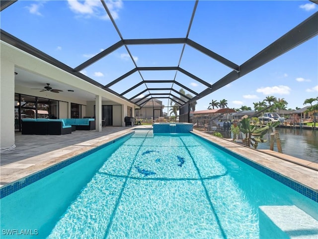 1431 SW 53rd Ln, Cape Coral, FL 33914 - view of swimming pool featuring an outdoor hangout area, a patio area, a pool with connected hot tub, a lanai, and ceiling fan