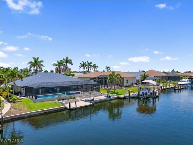 1431 SW 53rd Ln, Cape Coral, FL 33914 - water view featuring boat lift, a boat dock, and nearby suburban area