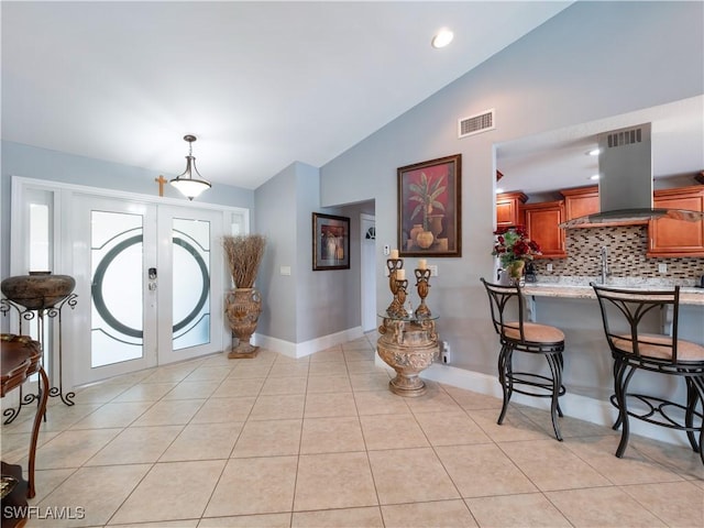 1431 SW 53rd Ln, Cape Coral, FL 33914 - entrance foyer featuring lofted ceiling and light tile patterned floors