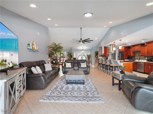 1431 SW 53rd Ln, Cape Coral, FL 33914 - living area with ceiling fan, healthy amount of natural light, light tile patterned floors, recessed lighting, and high vaulted ceiling