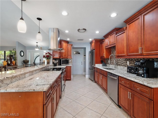 1431 SW 53rd Ln, Cape Coral, FL 33914 - kitchen featuring ventilation hood, stainless steel appliances, backsplash, a peninsula, and light stone counters