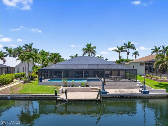 1431 SW 53rd Ln, Cape Coral, FL 33914 - rear view of property with a water view, an outdoor pool, a patio, and a lanai