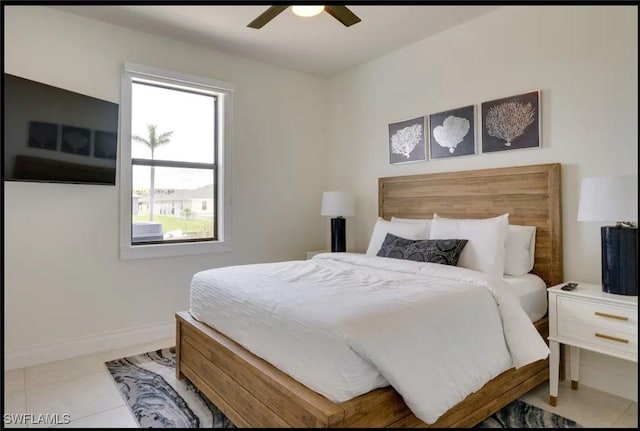 2229 SW 17th Pl, Cape Coral, FL 33991 - bedroom featuring light tile patterned floors and ceiling fan