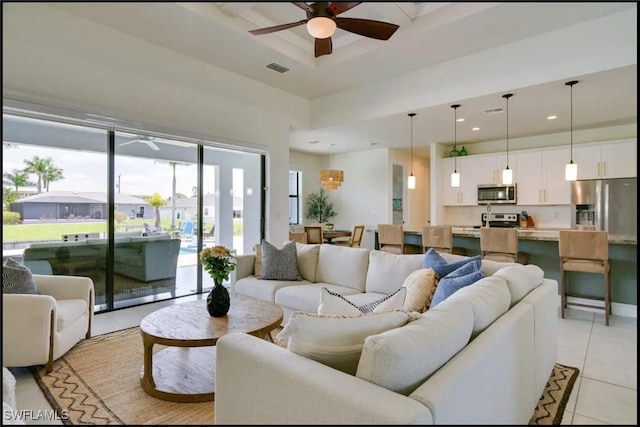 2229 SW 17th Pl, Cape Coral, FL 33991 - living area featuring ceiling fan, light tile patterned floors, a high ceiling, and recessed lighting