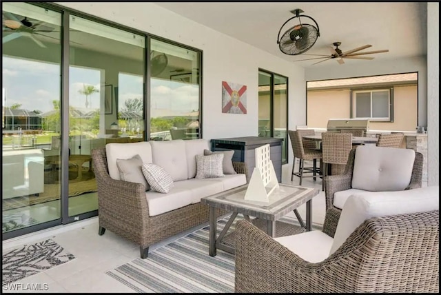 2229 SW 17th Pl, Cape Coral, FL 33991 - view of patio / terrace featuring an outdoor living space, an outdoor kitchen, ceiling fan, and outdoor dining area