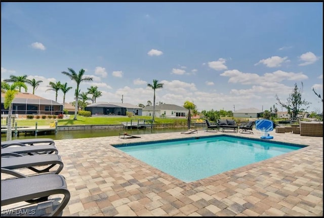 2229 SW 17th Pl, Cape Coral, FL 33991 - swimming pool featuring a patio area, a water view, and a residential view