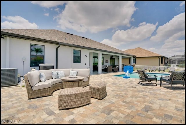 2229 SW 17th Pl, Cape Coral, FL 33991 - view of patio / terrace featuring an outdoor living space with a fire pit