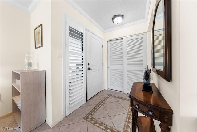 519 Seaview Ct Unit N4, Marco Island, FL 34145 - entryway with light tile patterned floors, ornamental molding, and inlaid floor details