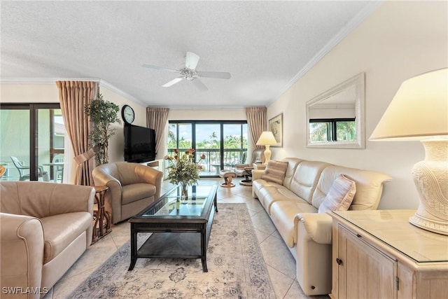519 Seaview Ct Unit N4, Marco Island, FL 34145 - living room featuring a ceiling fan, light tile patterned floors, a textured ceiling, and ornamental molding
