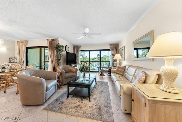 519 Seaview Ct Unit N4, Marco Island, FL 34145 - living area with ceiling fan, crown molding, a textured ceiling, and light tile patterned floors