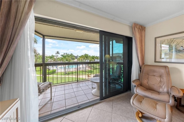 519 Seaview Ct Unit N4, Marco Island, FL 34145 - doorway with light tile patterned floors and plenty of natural light