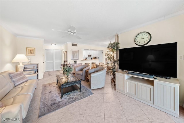 519 Seaview Ct Unit N4, Marco Island, FL 34145 - tiled living area featuring crown molding and a ceiling fan