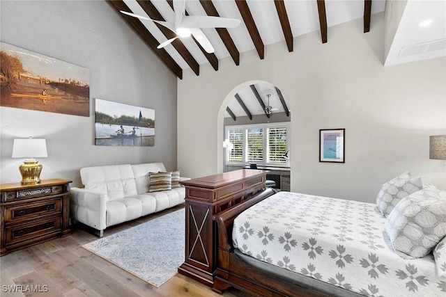 5850 Pelican Bay Blvd Unit C, Naples, FL 34108 - bedroom featuring wood finished floors and arched walkways