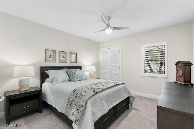5850 Pelican Bay Blvd Unit C, Naples, FL 34108 - bedroom featuring light colored carpet, a closet, and ceiling fan