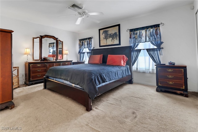 1439 SW Embers Ter, Cape Coral, FL 33991 - carpeted bedroom with a ceiling fan