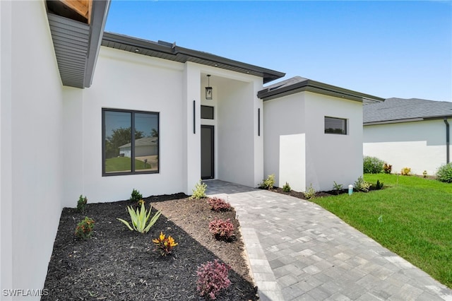 1405 SW 28th Ter, Cape Coral, FL 33914 - view of front facade with stucco siding and a front yard