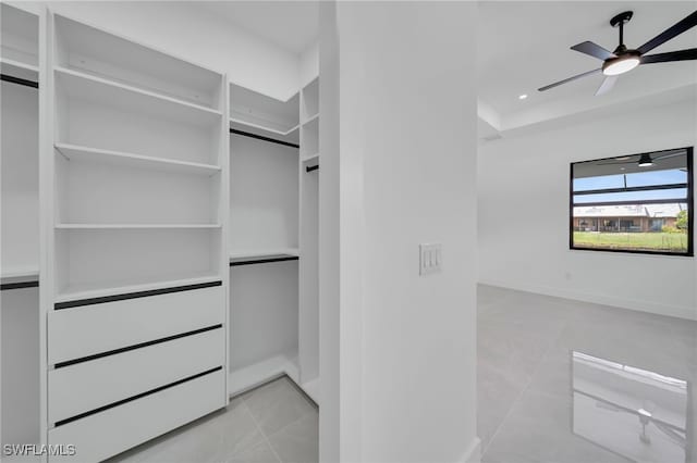 1405 SW 28th Ter, Cape Coral, FL 33914 - walk in closet featuring a ceiling fan and tile patterned floors