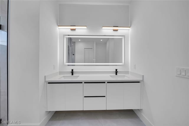 1405 SW 28th Ter, Cape Coral, FL 33914 - full bathroom featuring double vanity and tile patterned floors