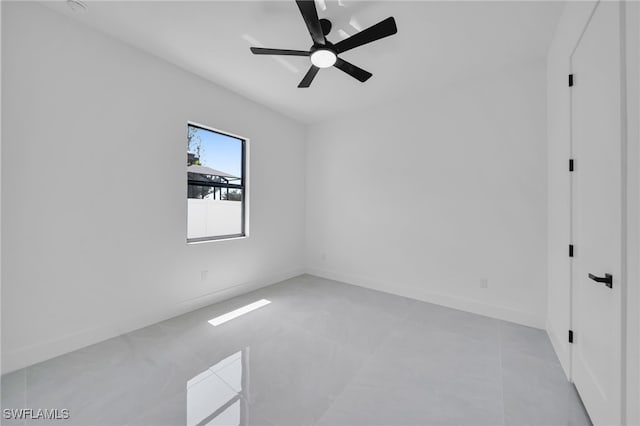 1405 SW 28th Ter, Cape Coral, FL 33914 - empty room with ceiling fan and light tile patterned flooring