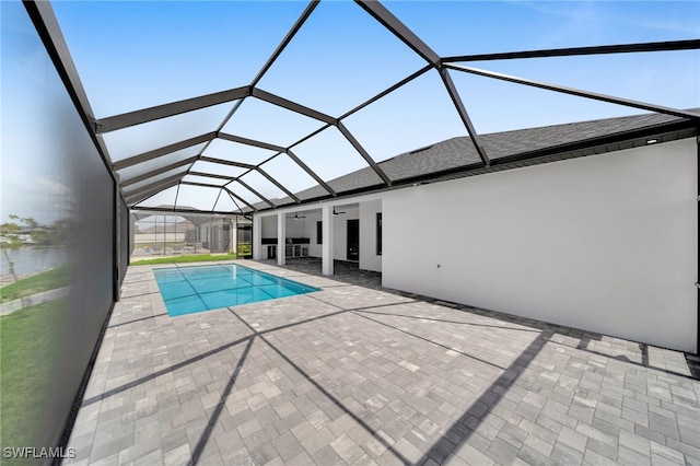 1405 SW 28th Ter, Cape Coral, FL 33914 - outdoor pool featuring a patio, ceiling fan, and glass enclosure