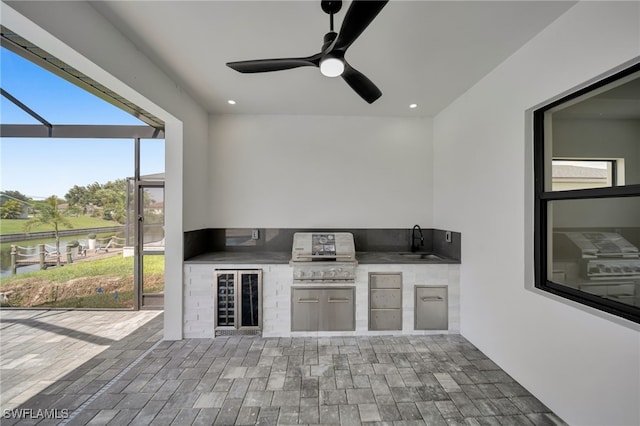 1405 SW 28th Ter, Cape Coral, FL 33914 - view of patio / terrace with area for grilling, beverage cooler, glass enclosure, and ceiling fan