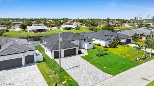 1405 SW 28th Ter, Cape Coral, FL 33914 - aerial perspective of suburban area featuring a large body of water