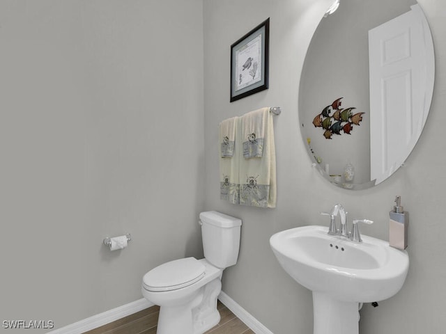 15904 Talon Ter, Punta Gorda, FL 33982 - half bath featuring toilet and wood finished floors
