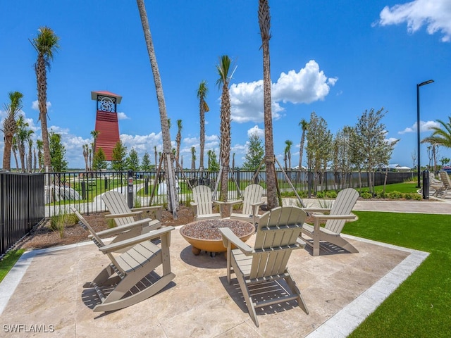 15904 Talon Ter, Punta Gorda, FL 33982 - view of patio featuring an outdoor fire pit