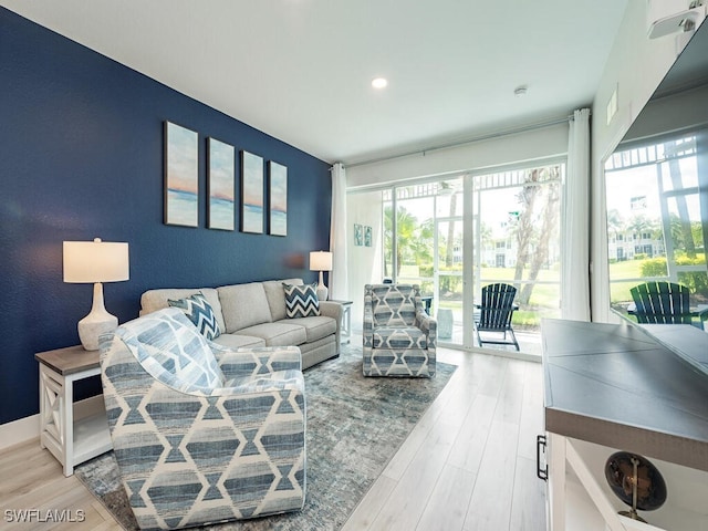 7970 Mahogany Run Ln Unit 216, Naples, FL 34113 - living area featuring light wood-style flooring and recessed lighting