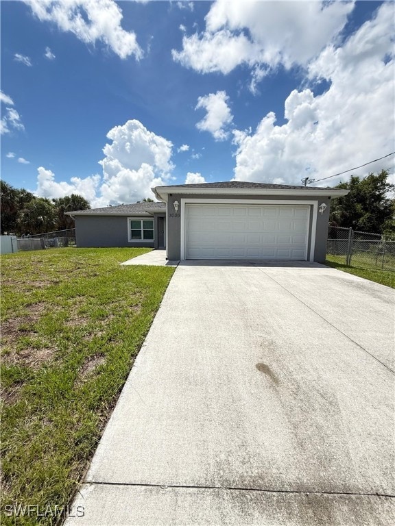 3006 Base Ct, Labelle, FL 33935 - ranch-style home featuring concrete driveway, stucco siding, and a garage