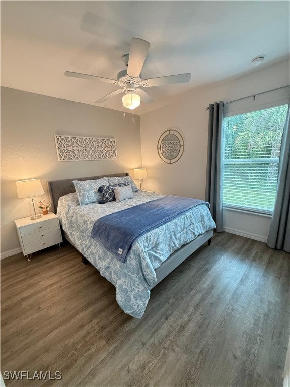 3006 Base Ct, Labelle, FL 33935 - bedroom featuring wood finished floors and ceiling fan