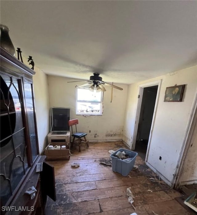 2027 Mark Ave, Punta Gorda, FL 33950 - living area with ceiling fan and wood finished floors