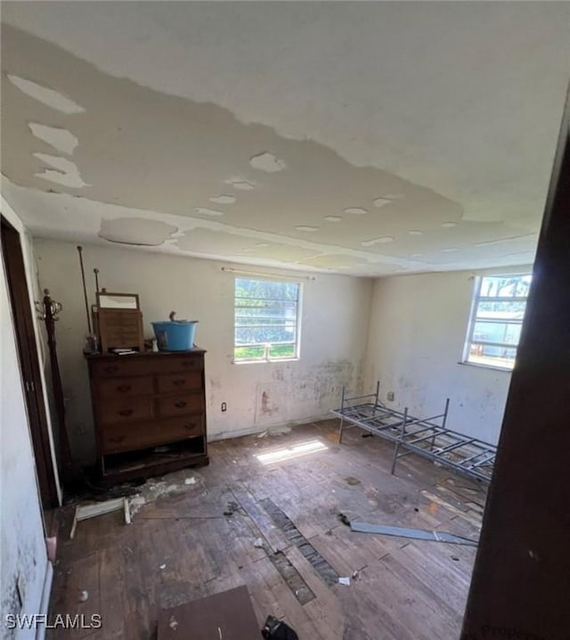 2027 Mark Ave, Punta Gorda, FL 33950 - unfurnished bedroom with multiple windows