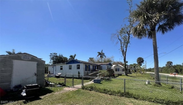 2027 Mark Ave, Punta Gorda, FL 33950 - view of yard featuring a storage shed and a gate
