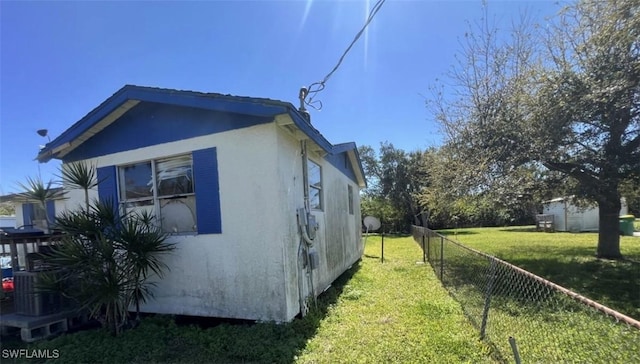 2027 Mark Ave, Punta Gorda, FL 33950 - view of side of property featuring stucco siding