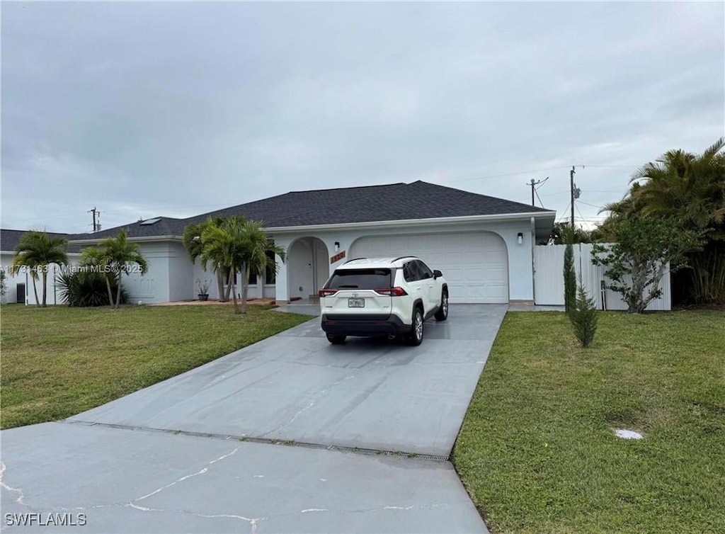 1520 SE 20th Ct, Cape Coral, FL 33990 - ranch-style house featuring concrete driveway and a garage