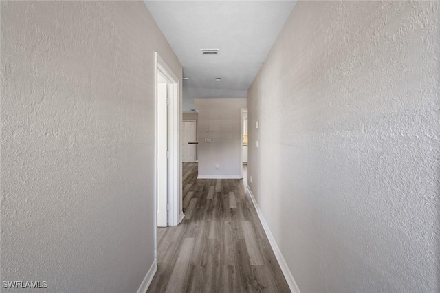 27924 Quinn St, Bonita Springs, FL 34135 - hall featuring wood finished floors and baseboards