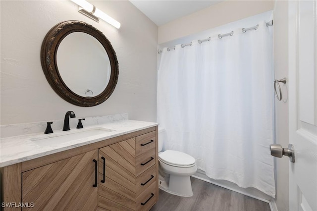 27924 Quinn St, Bonita Springs, FL 34135 - full bathroom with vanity and wood finished floors