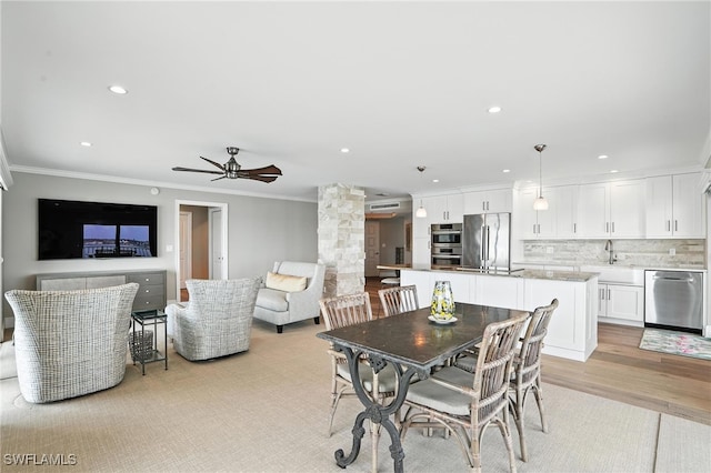 1100 S Collier Blvd Unit 723, Marco Island, FL 34145 - dining area featuring ornamental molding, a ceiling fan, recessed lighting, light wood finished floors, and decorative columns