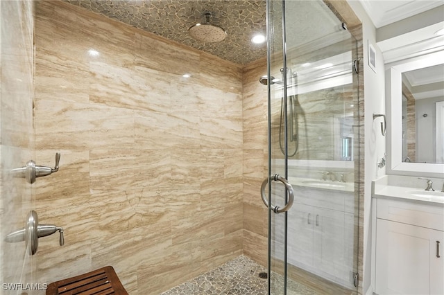 1100 S Collier Blvd Unit 723, Marco Island, FL 34145 - bathroom featuring a shower stall, vanity, and ornamental molding