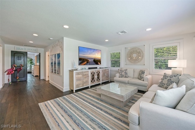 1129 8th Ter N, Naples, FL 34102 - living room featuring dark wood-style floors and recessed lighting