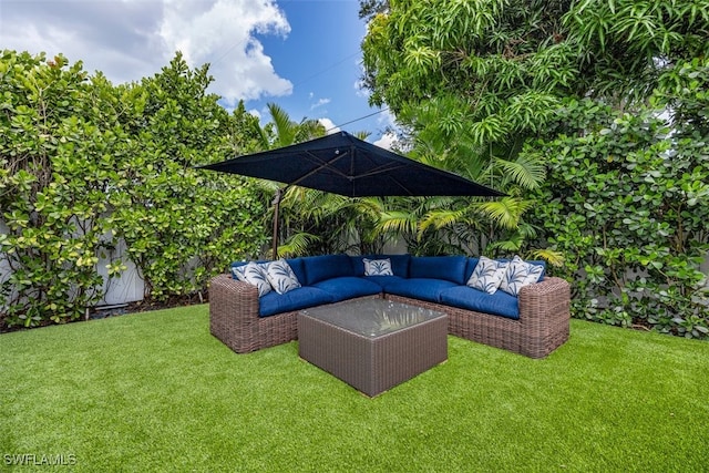 1129 8th Ter N, Naples, FL 34102 - view of green lawn featuring outdoor lounge area