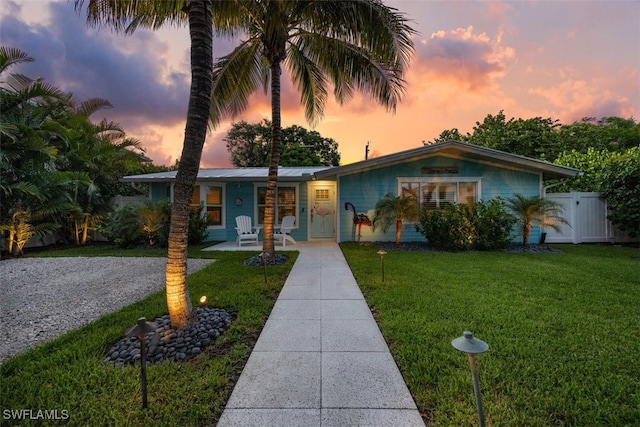 1129 8th Ter N, Naples, FL 34102 - view of front of property with covered porch