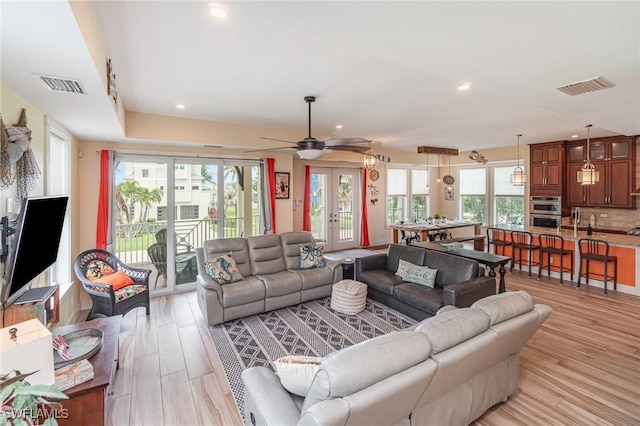 830 San Carlos Dr, Fort Myers Beach, FL 33931 - living room featuring ceiling fan, light wood-style flooring, and recessed lighting