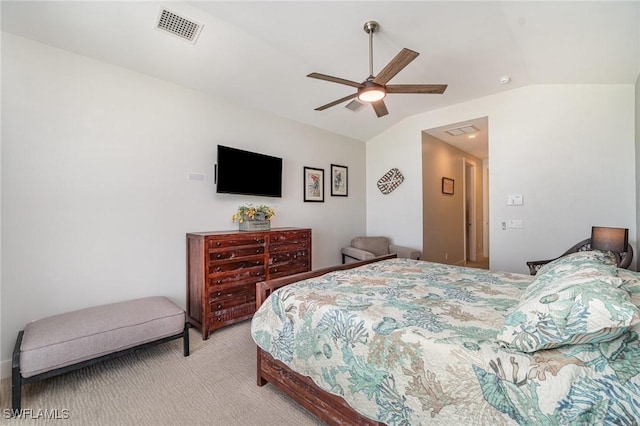 830 San Carlos Dr, Fort Myers Beach, FL 33931 - bedroom with lofted ceiling, light carpet, and a ceiling fan