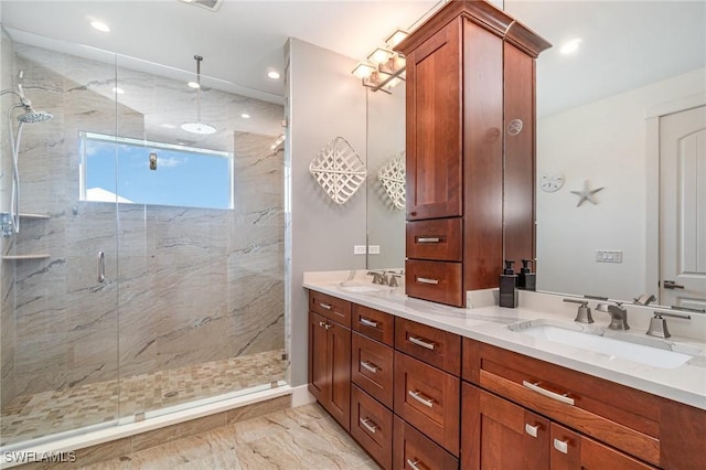 830 San Carlos Dr, Fort Myers Beach, FL 33931 - bathroom with double vanity, a marble finish shower, marble finish flooring, and recessed lighting