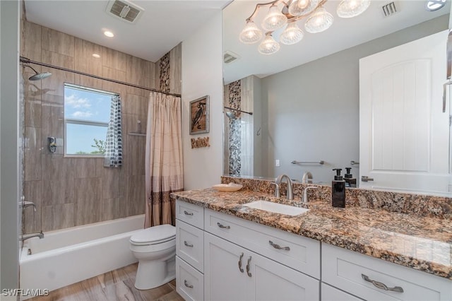 830 San Carlos Dr, Fort Myers Beach, FL 33931 - full bathroom with vanity, shower / tub combo with curtain, a chandelier, and wood finished floors