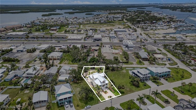 830 San Carlos Dr, Fort Myers Beach, FL 33931 - aerial perspective of suburban area featuring a nearby body of water and property parcel outlined