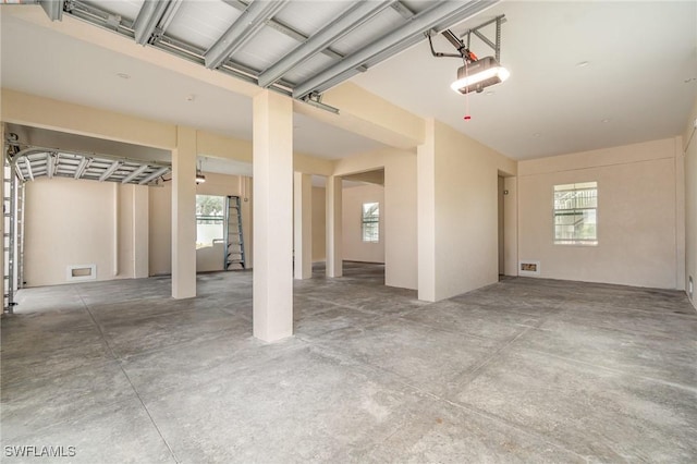 830 San Carlos Dr, Fort Myers Beach, FL 33931 - garage featuring a garage door opener