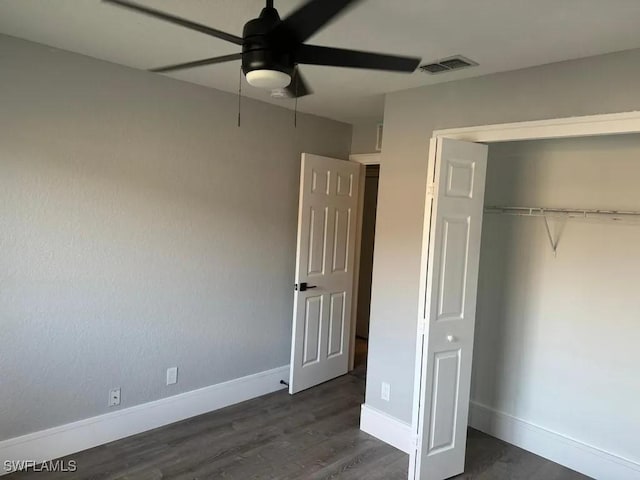 1614 SW 27th St, Cape Coral, FL 33914 - unfurnished bedroom featuring dark wood finished floors, a closet, and a ceiling fan